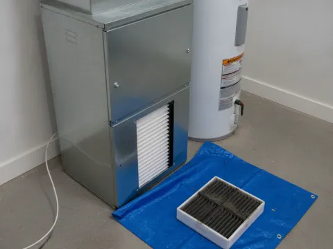 Furnace with new air filter installed after heating maintenance service in Providence Village